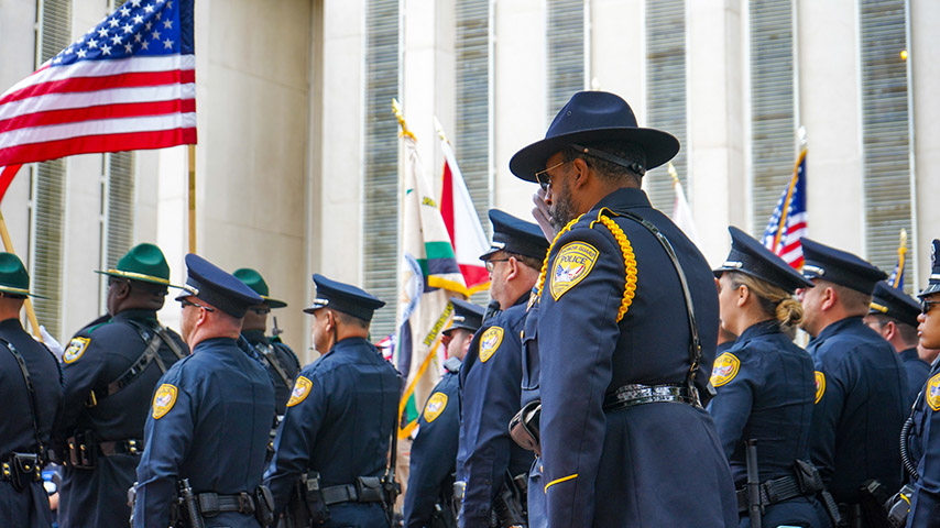 Officers take part in a ceremony at the Florida Capitol